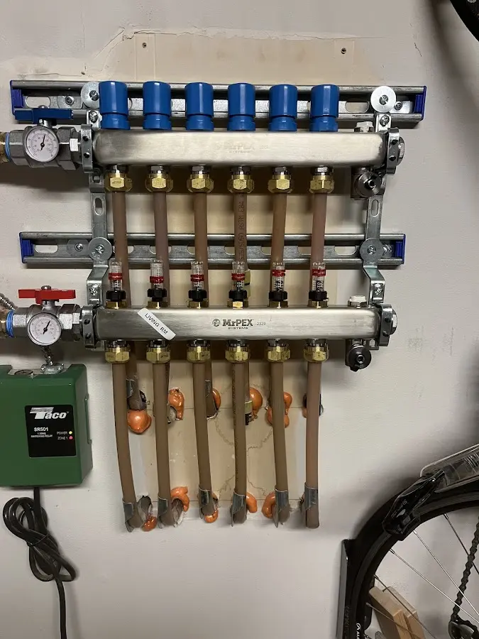 Plumber performing Gas Line Installation at a residential property in Brent